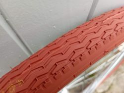 650B x 44 semi-comfort brick red 44 - 584 Casumina tyre