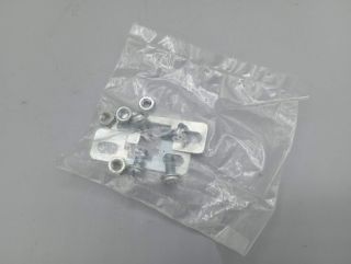 Plate and screws for steel toe clips